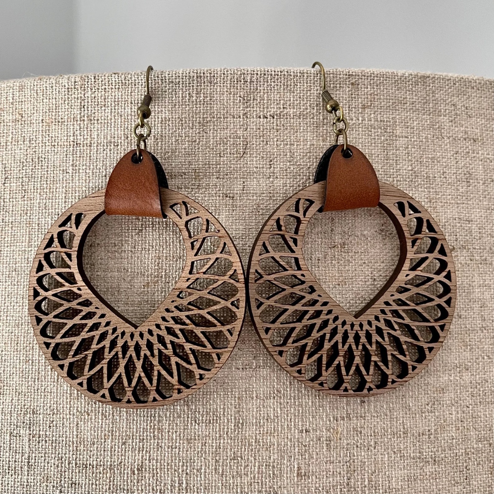 Wood and leather earrings close-up
